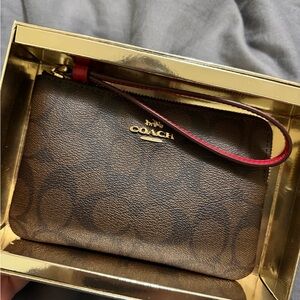 Coach Dark Brown Wristlet with Gold Accents